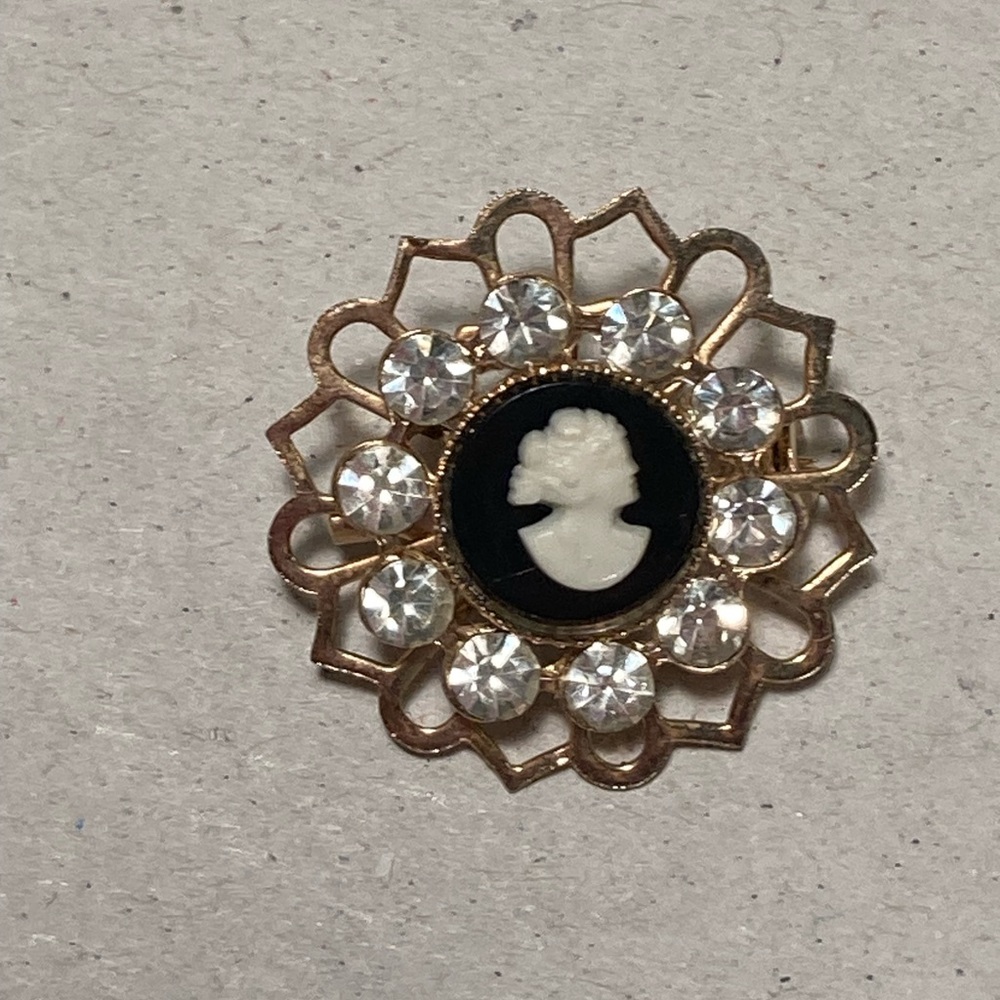 Vintage, gold tone, cameo brooch with rhinestones